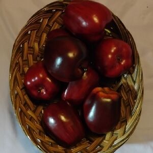 Red and Brown Woven Baskets with Decorative Accents
